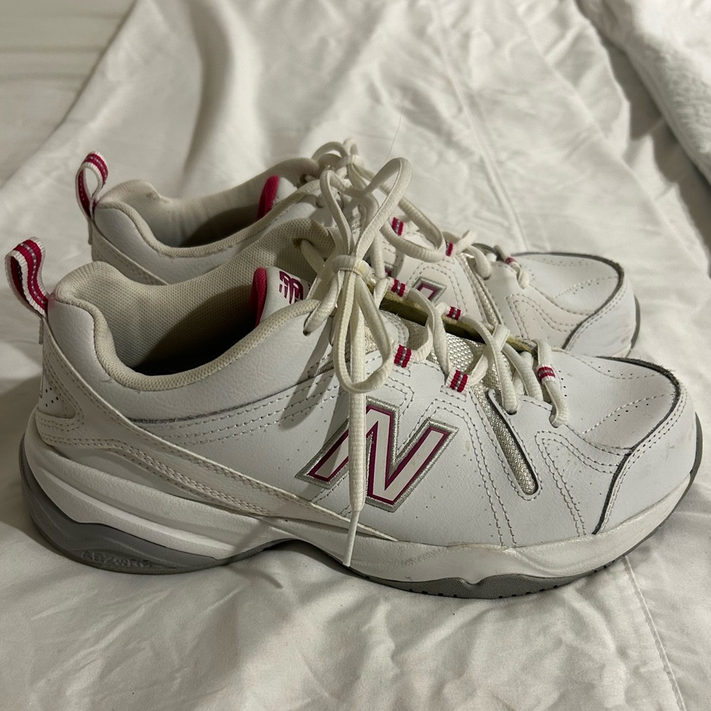 New Balance 608v4 women’s size 9 white athletic shoes.